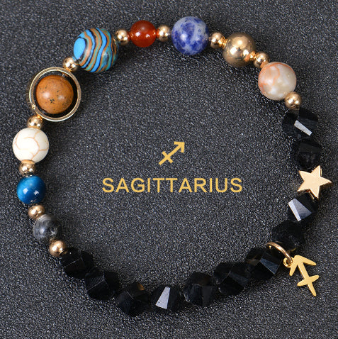 Carry the energy of the cosmos wherever you go. This Eight Planets Twelve Constellations Frosted Stone Beaded Bracelet blends.