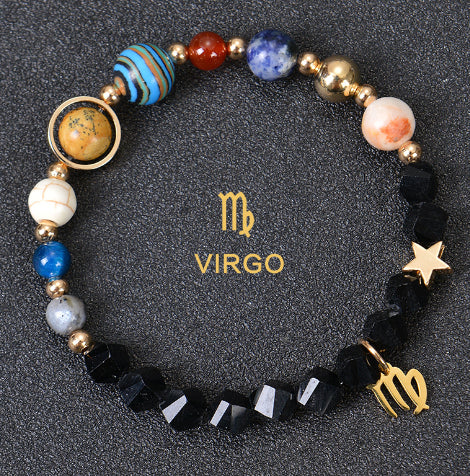 Carry the energy of the cosmos wherever you go. This Eight Planets Twelve Constellations Frosted Stone Beaded Bracelet blends.