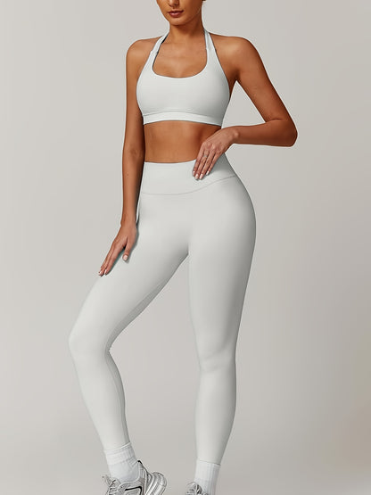 Women’s yoga set with supportive sports bra and high-waist leggings that sculpt and stay put.