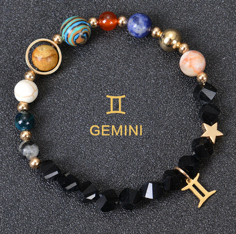 Carry the energy of the cosmos wherever you go. This Eight Planets Twelve Constellations Frosted Stone Beaded Bracelet blends.
