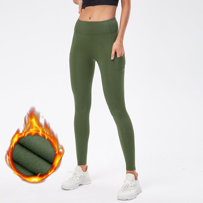 Warm high-waist running pants with moisture-wicking fabric, supportive fit, and pockets.