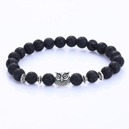 This Owl Tiger’s Eye Volcanic Stone Energy Bracelet combines powerful protection stones with an owl charm representing wisdom and intuition.