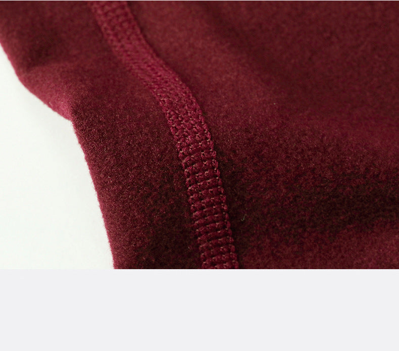 Warm high-waist running pants with moisture-wicking fabric, supportive fit, and pockets.
