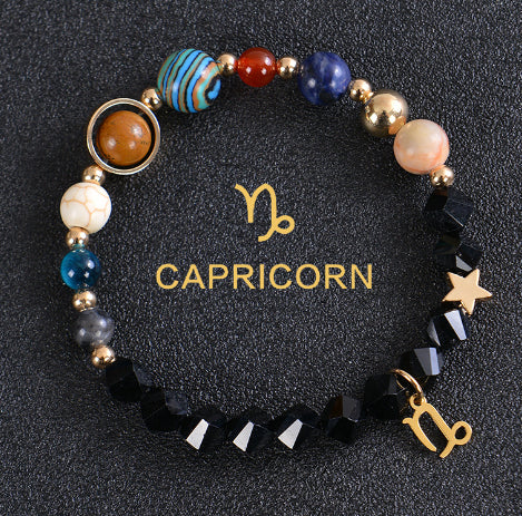 Carry the energy of the cosmos wherever you go. This Eight Planets Twelve Constellations Frosted Stone Beaded Bracelet blends.