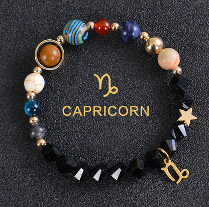 Carry the energy of the cosmos wherever you go. This Eight Planets Twelve Constellations Frosted Stone Beaded Bracelet blends.