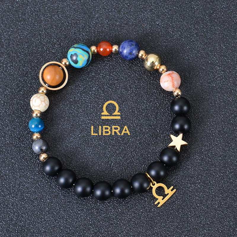 Carry the energy of the cosmos wherever you go. This Eight Planets Twelve Constellations Frosted Stone Beaded Bracelet blends.