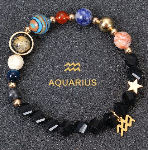 Carry the energy of the cosmos wherever you go. This Eight Planets Twelve Constellations Frosted Stone Beaded Bracelet blends.
